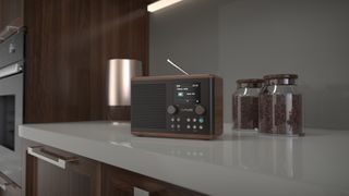 Pure Classic H4 radio in walnut on a kitchen counter 