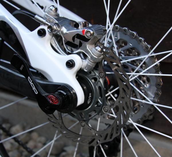 140mm rear rotor adjacent to SRAM XX 12x36 cassette.