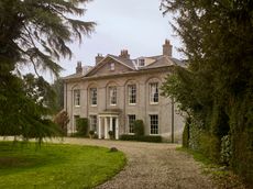 Front view of house. Higham Hall’s austere entrance façade of ‘white brick’. Credit: Paul Highnam/Country Life