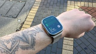 An image of an Apple Watch on a wrist, showing the Noise app and decibel reading