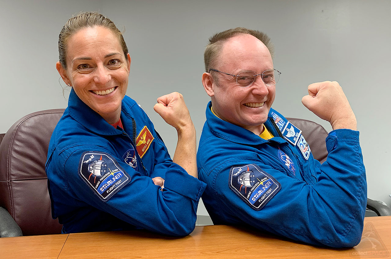 NASA astronauts Nicole Mann and Mike Fincke display the original Boeing Starliner Crew Flight Test (CFT) patch on their shoulders. Both were at one time assigned the CFT crew but were since reassigned to SpaceX's Crew-5 and serving as backup the CFT crew, respectively.