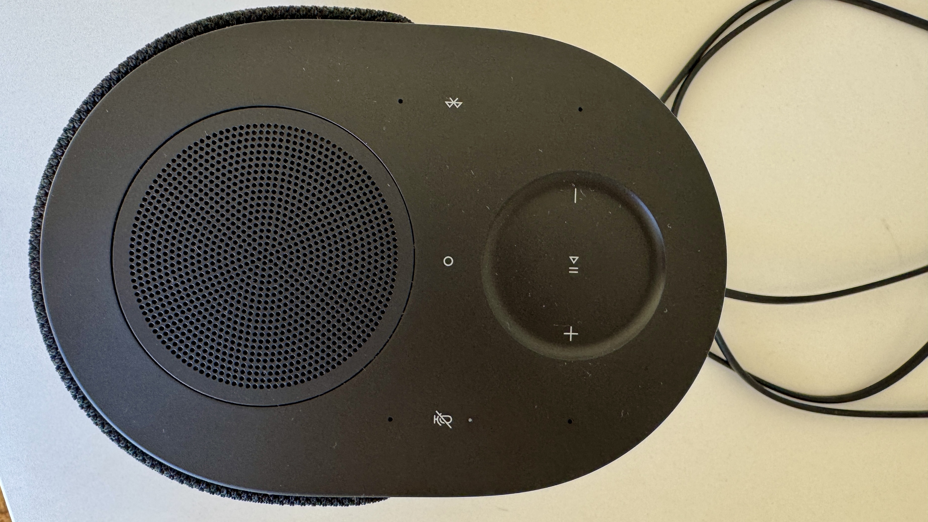 Bose Lifestyle Ultra speaker on a white table