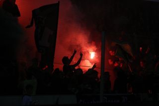 Belgian fans light flares during a derby between Club Brugge and Cercle Brugge in September 2019.