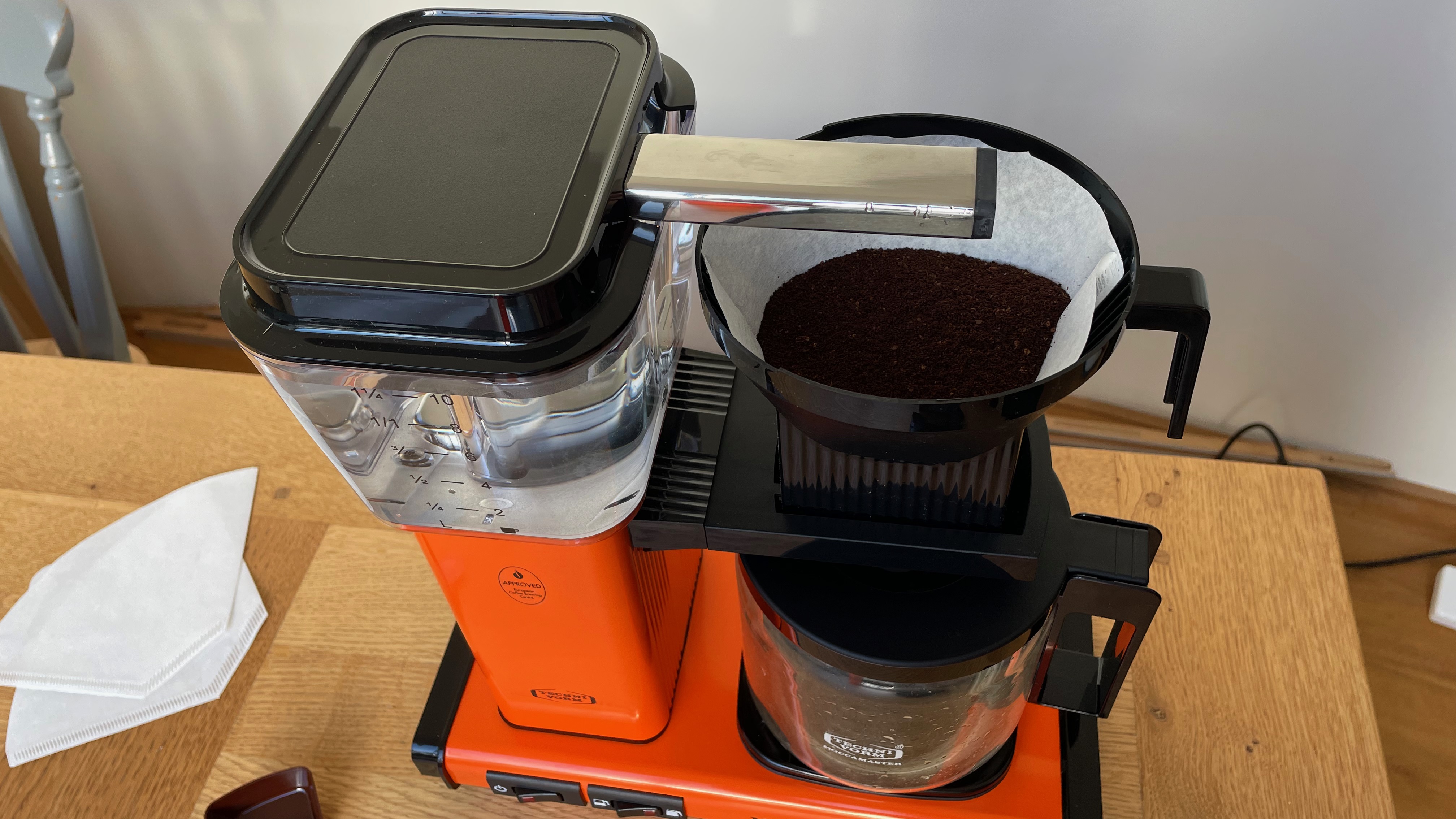 Moccamaster with grounds in filter paper