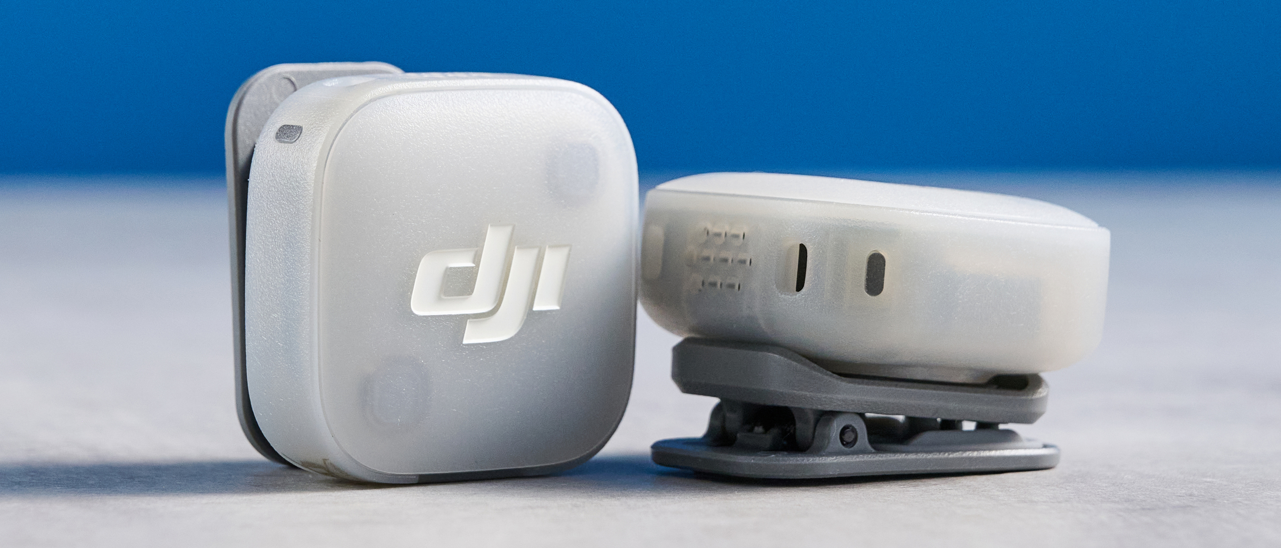 the dji mic mini 2 for camera and smartphone conent creators photographed against the blue tom's guide background