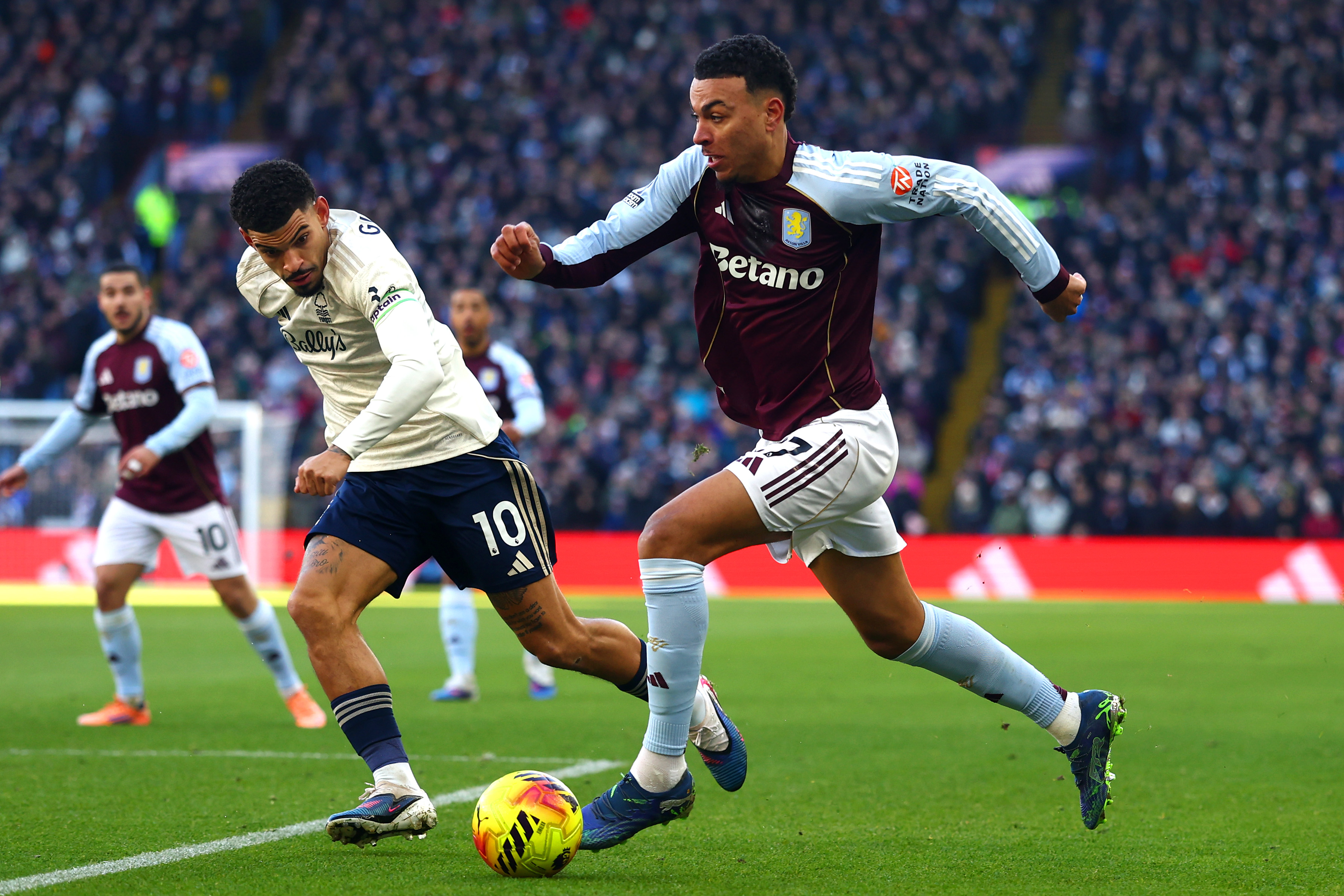 Nottingham Forest's Morgan Gibbs-White battles Aston Villa midfielder Morgan Rogers during the reverse fixture earlier this season