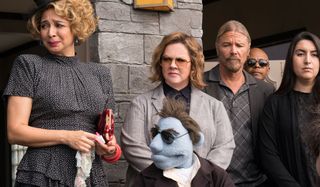 The Happytime Murders Melissa McCarthy and Maya Rudolph attend a puppet funeral