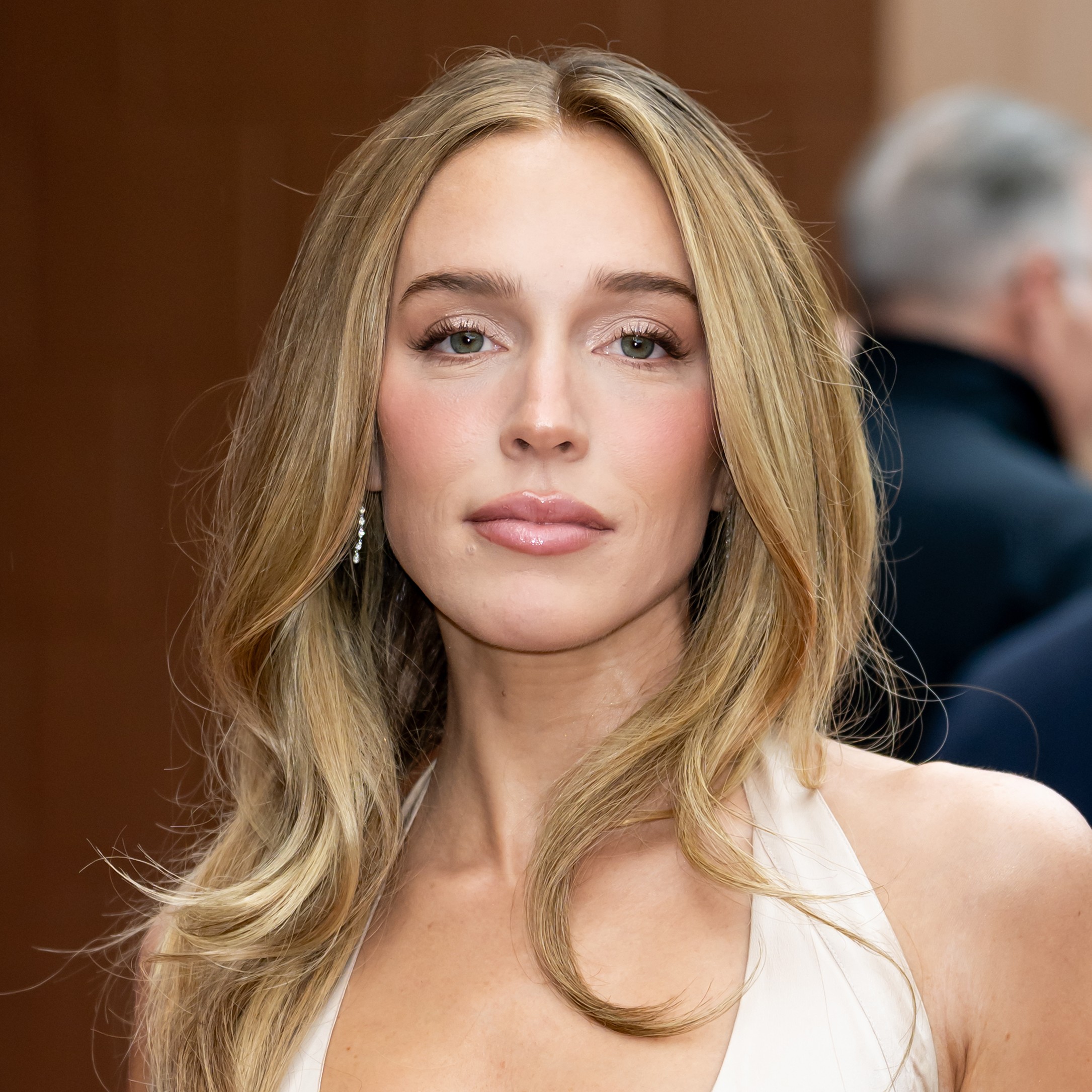 Alex Cooper shows off her velvet blonde highlights.