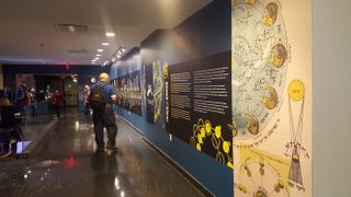 Visitors explore the new "Jews In Space" exhibit at the Center for Jewish History in Manhattan.