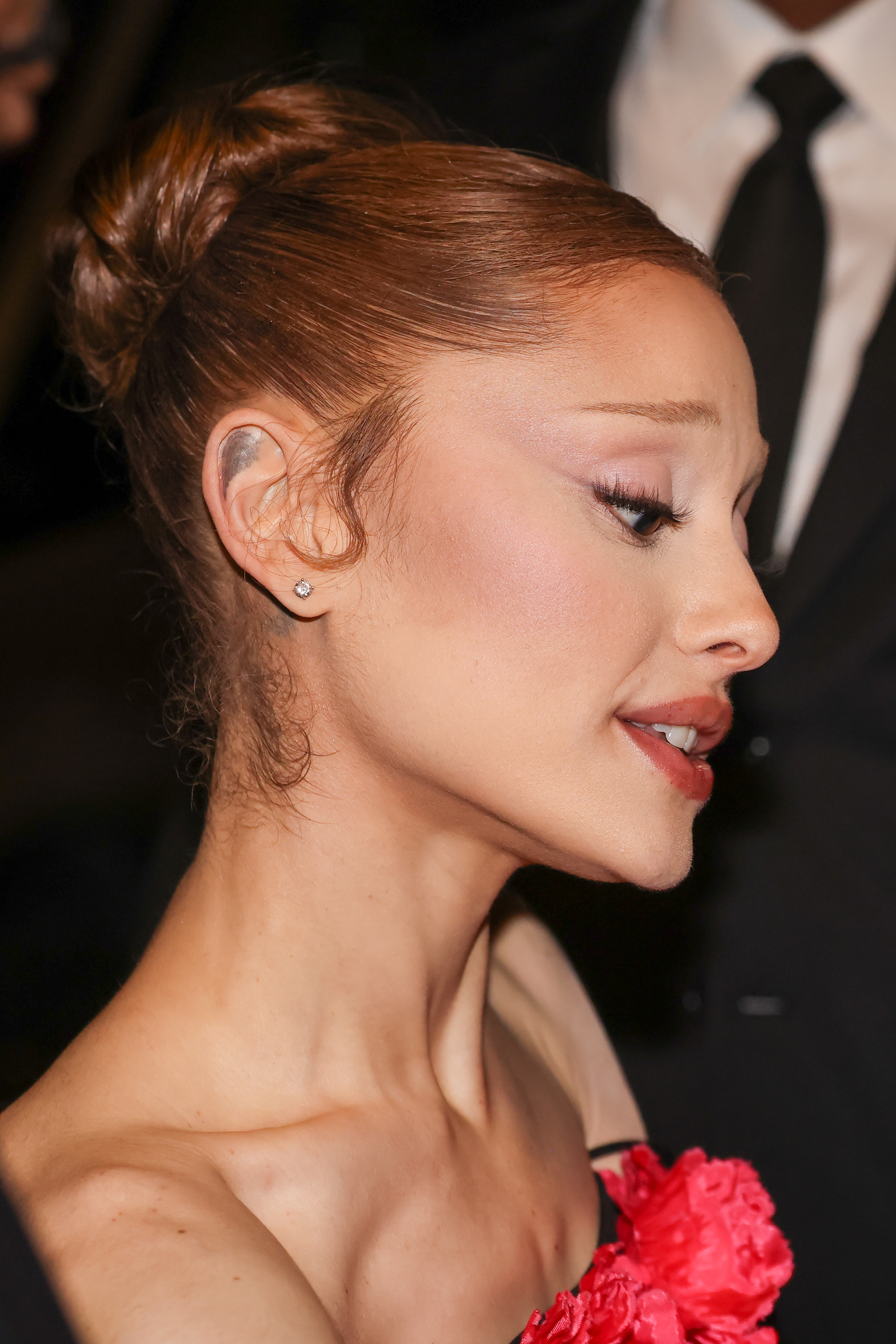 Ariana Grande close-up of black gown