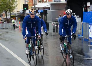Tyler Farrar and Christian Vande Velde ride in the rain