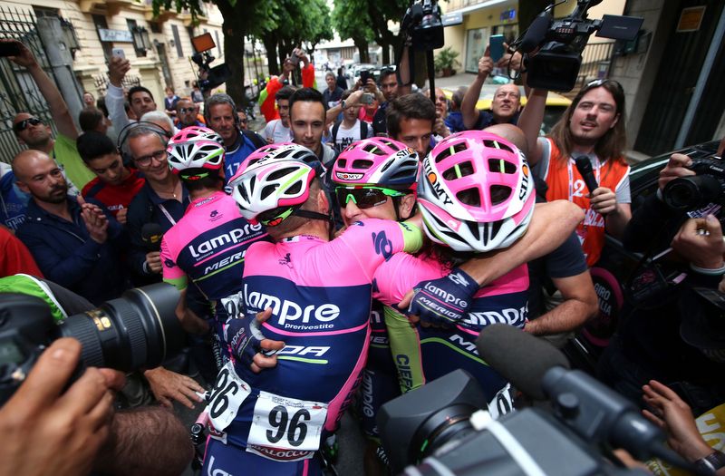 Lampre-Merida riders swamp Diego Ulissi after his stage win
