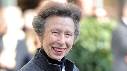 Princess Anne's hard-working nature revealed, seen here the Princess Royal holds a gifted scarf made from St James Quarter tartan