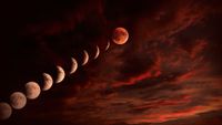 an illustration showing the moon getting progressively darker and then turning red during a total lunar eclipse