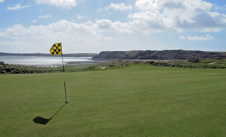 Tenby Golf Club and the ocean pictured