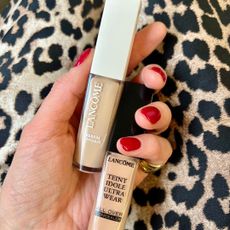 Lancôme concealer - Katie Thomas holding Lancôme Teint Idole Ultra Wear All Over Concealer and Lancôme Teint Idôle Ultra Wear Care and Glow Concealer 