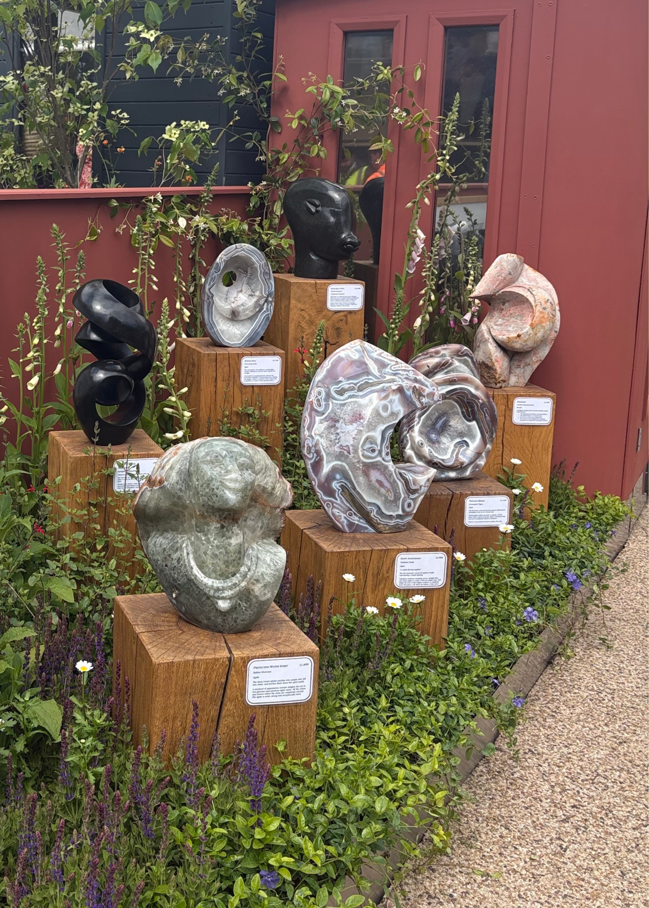 A row of marble sculptures by Guruve at the Chelsea Flower Show 2026