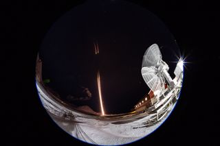 This time-lapse image shows the first and second stages of the Black Brant X sounding rockets for the VISIONS-2 mission launching from Ny-Ålesund, Svalbard, in Norway.