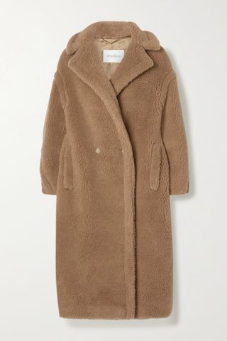 Teddy Bear Icon oversized camel hair and silk-blend coat in front of a plain backdrop