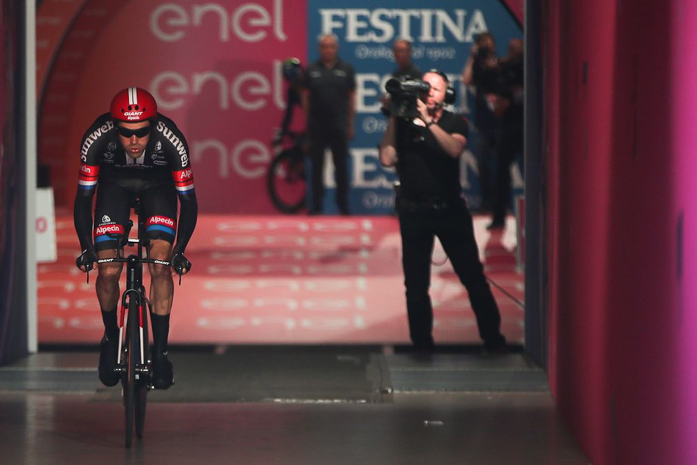 Tom Dumoulin (Giant - Alpecin) starts his Giro time trial in the Appeldoorn Omnisport center.