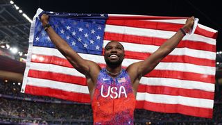 PARIS, FRANCE - AUGUST 04: Noah Lyles of Team United States celebrates winning the gold medal after competing the Men's 100m Final on day nine of the Olympic Games Paris 2024 at Stade de France on August 04, 2024 in Paris, France.