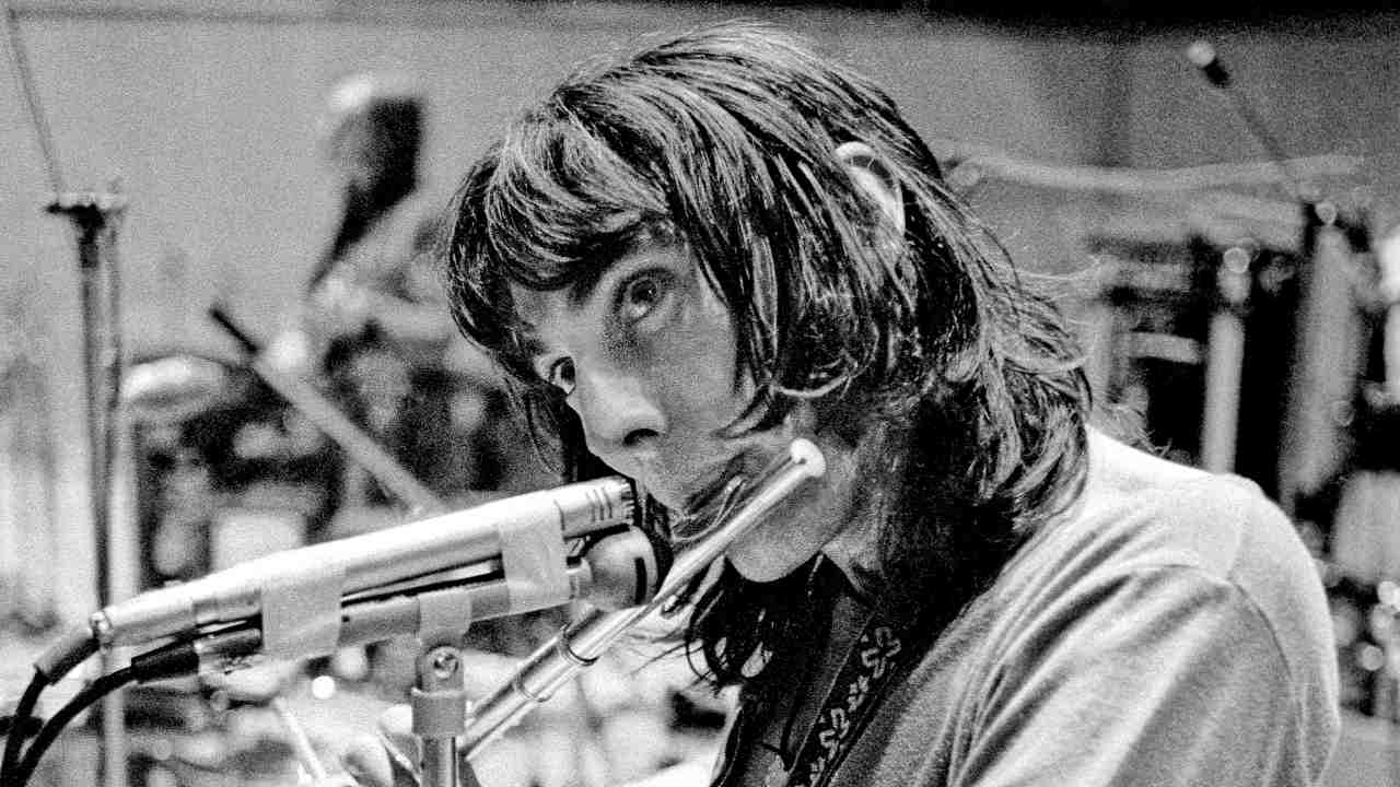 Chris Wood playing flute in the studio in 1971