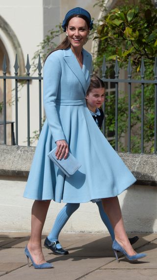 Kate Middleton with Princess Charlotte attend the traditional Easter Sunday Church service