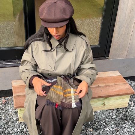 aysha sow wearing a newsboy cap