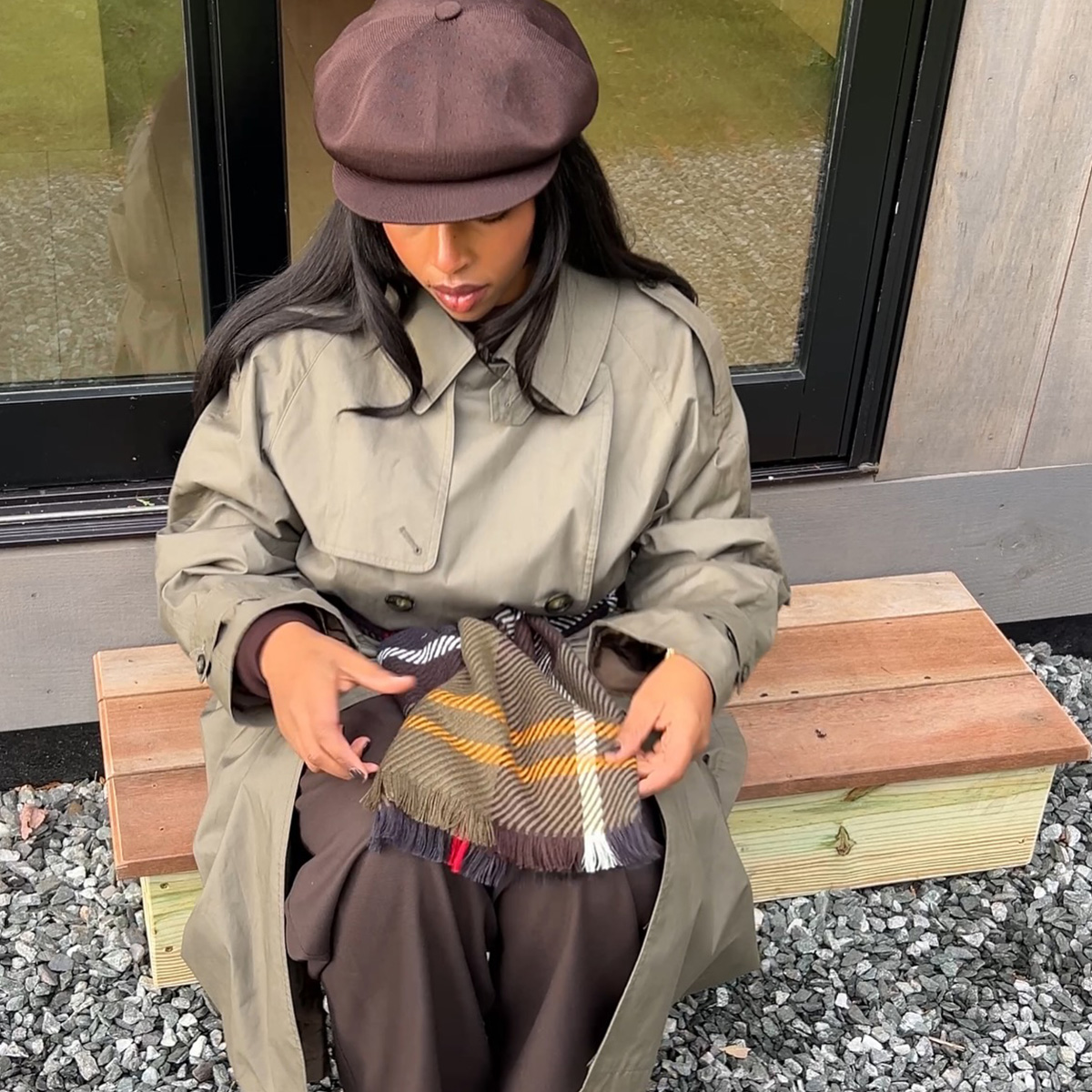 aysha sow wearing a newsboy cap