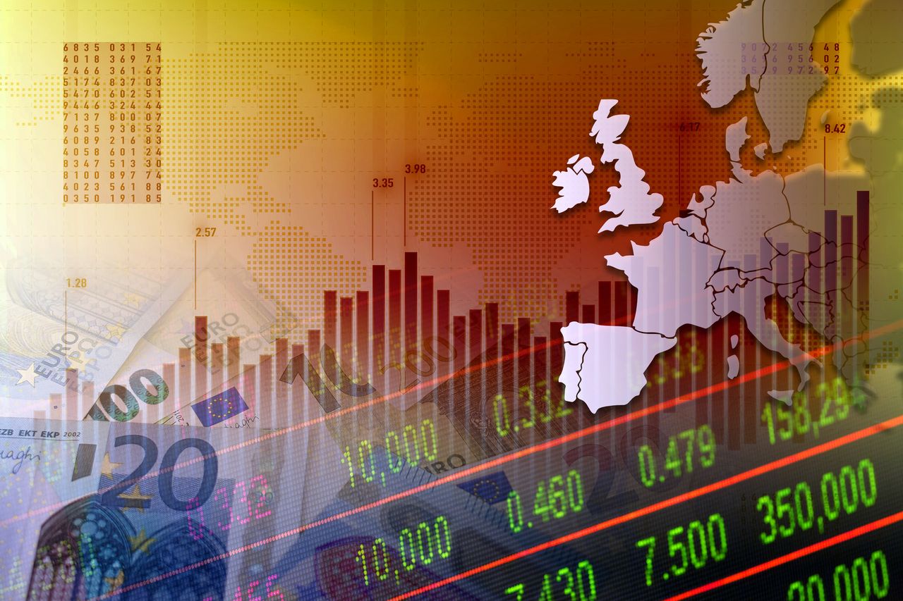 Europe map, cash euro bills and stock market indicators