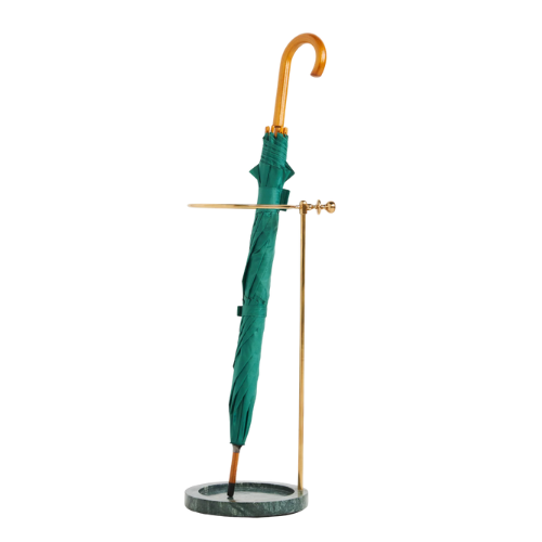 A gold umbrella stand