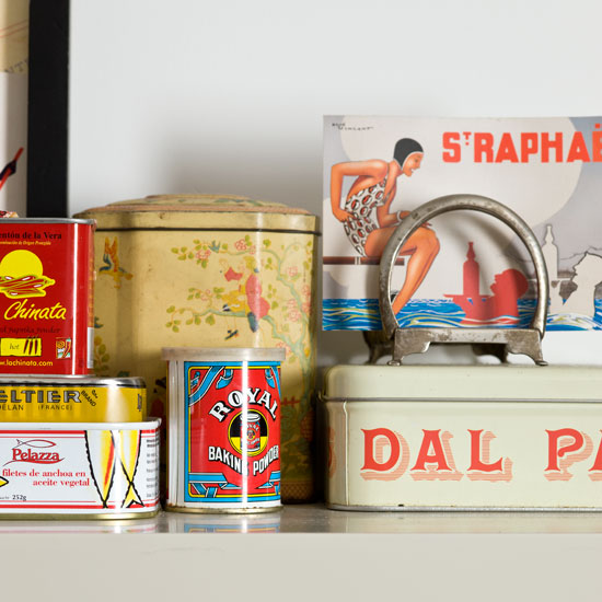 vintage look kitchen with white wall and shelf