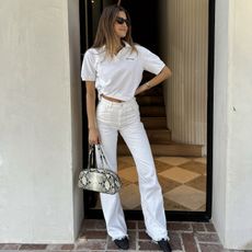 Sara walker in an all white outfit