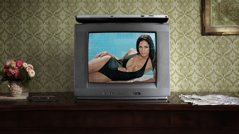 A photo of Miriam Rivera wearing a swimsuit mocked up on an old television set