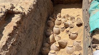 Ancient wine jars in the tomb of Queen Meret-Neith in Abydos during the excavation.