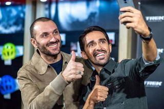 Ivan Basso and Alberto Contador take a selfie at a ceremony welcoming Gruppo Uvet to Contador's foundation.