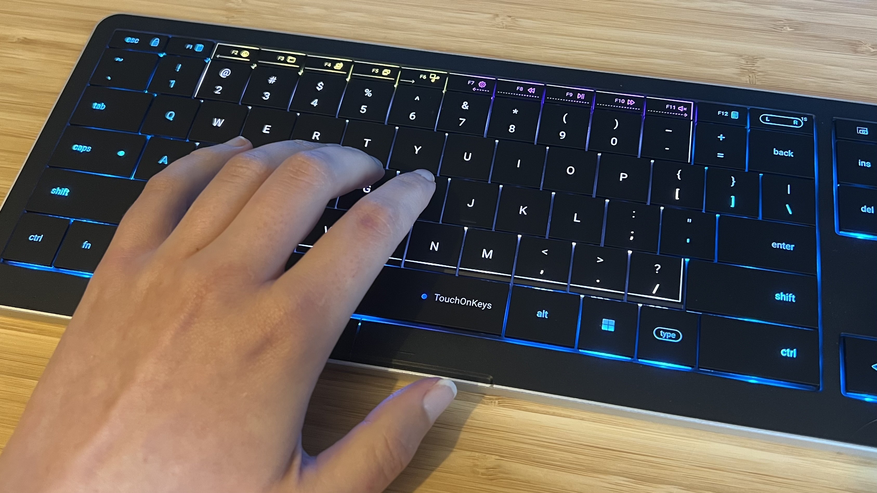 Hand using CLVX 1 in touchpad mode