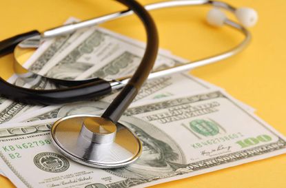 Stethoscope on Dollar, Medical Care Cost Concept