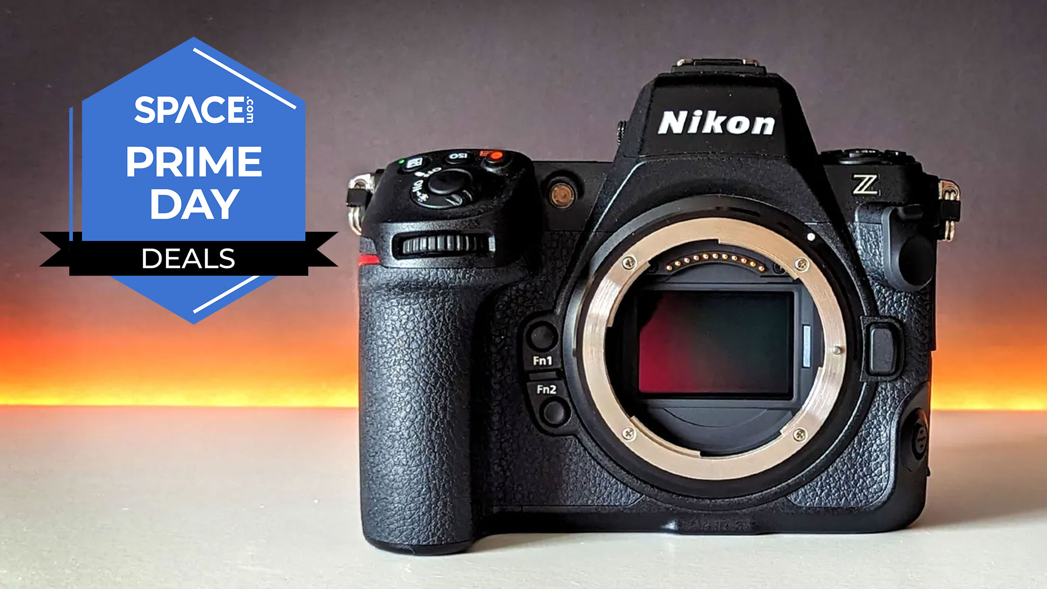 A Nikon Z8 on a white table with an orange and black background with the space.com prime day deals logo in the top left
