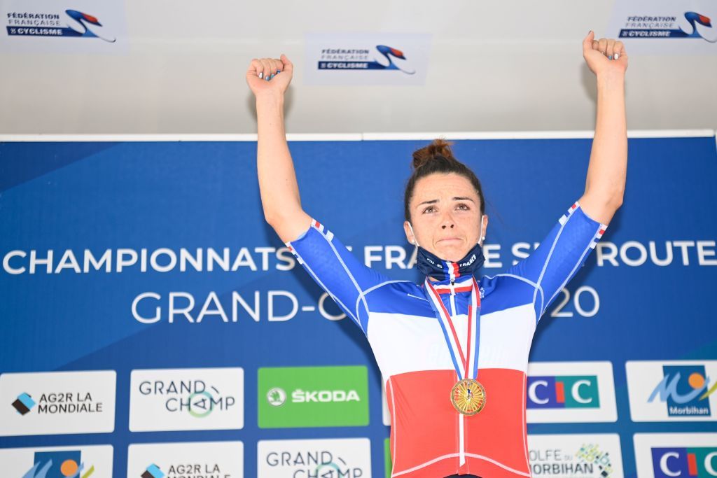 Gold medalist Audrey CordonRagot celebrates on the podium after winning the French Elite women road cycling championship in Grand Champ western France on August 22 2020 Photo by Damien MEYER AFP Photo by DAMIEN MEYERAFP via Getty Images