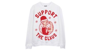 best christmas jumpers illustrated by a sweatshirt featuring the slogan Support the Claus and a woman in a Santa hat