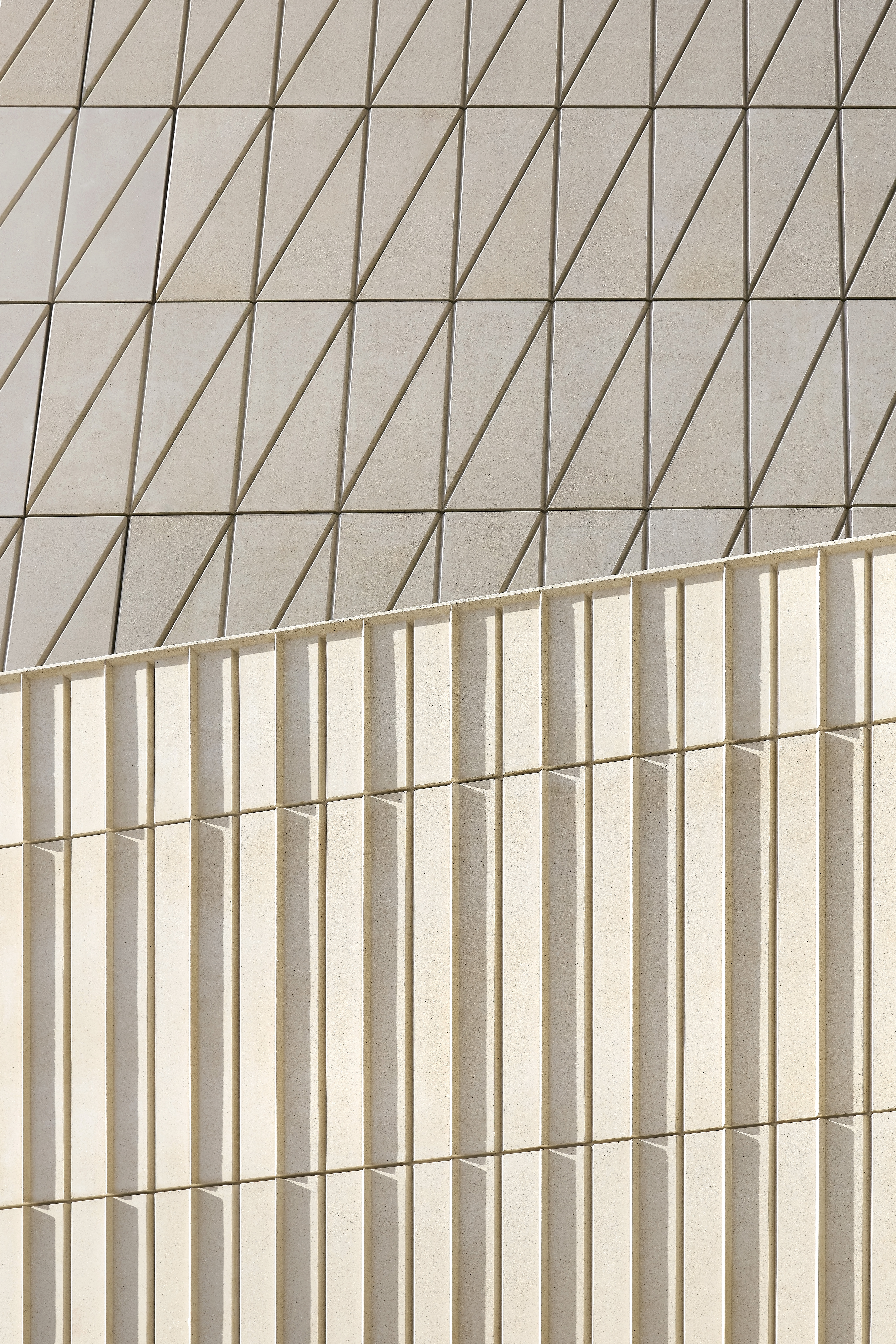 exterior views of V&amp;amp;A East Museum, with its faceted patterned facade