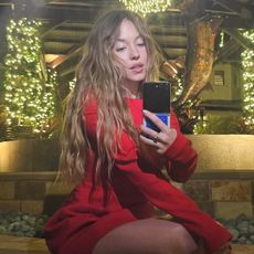 Sydney Sweeney wearing a red sweater