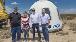 Solstar employees with New Shepard crew capsule