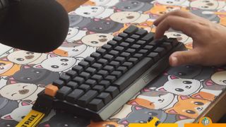 A still from a YouTube video of someone using a Wooting keyboard with the new Lekker V2 switches, now with more lube!