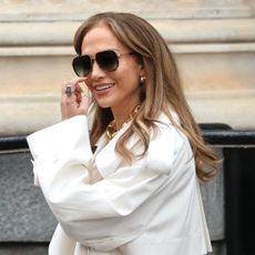 Jennifer Lopez wears white sneakers from Nike's collab with Off-White.