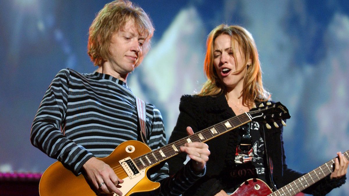 Peter Stroud (left) and Sheryl Crow perform onstage