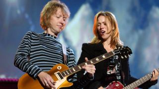 Peter Stroud (left) and Sheryl Crow perform onstage