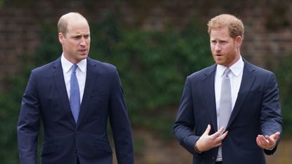 Prince William, Duke of Cambridge (left) and Prince Harry, Duke of Sussex arrive for the unveiling of a statue they commissioned of their mother Diana, Princess of Wales, in the Sunken Garden at Kensington Palace, on what would have been her 60th birthday on July 1, 2021 in London, England.