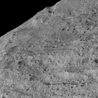 This view of Ceres, taken by NASA's Dawn spacecraft on December 10, shows an area in the southern mid-latitudes of the dwarf planet. It is located in an area around a crater chain called Samhain Catena, from an approximate distance of 240 miles (385 kilometers) from Ceres.